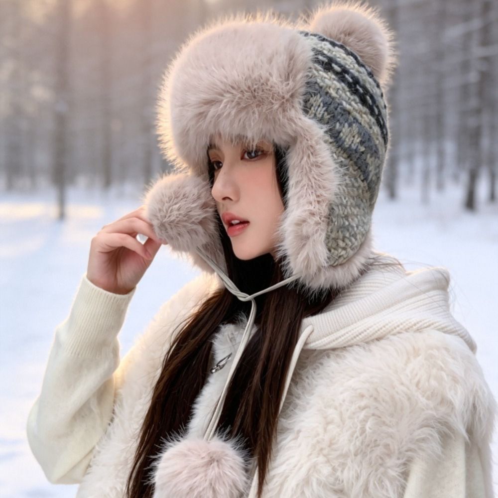 スタイリッシュなポリエステル製ニットトラッパーハット ポンポ - Winter Trapper Hat のレビューと価格