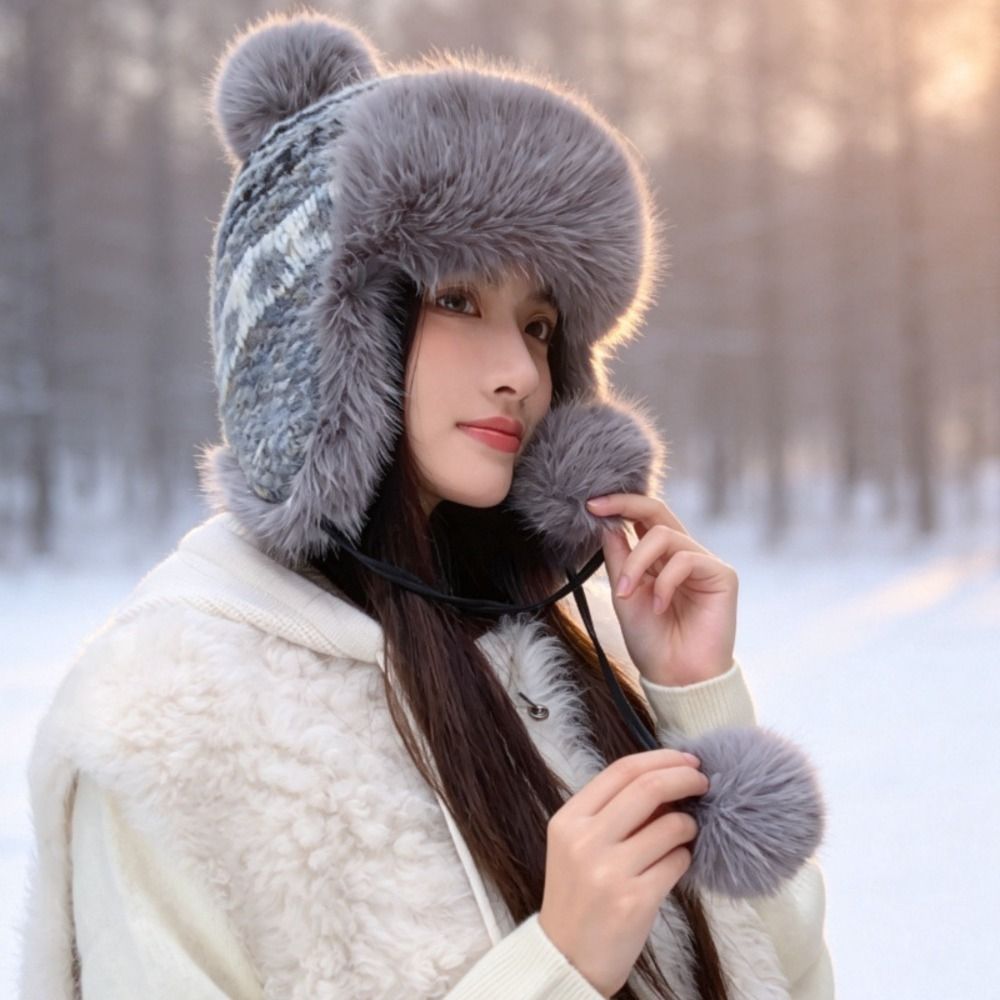 スタイリッシュなポリエステル製ニットトラッパーハット ポンポ - Winter Trapper Hat のレビューと価格