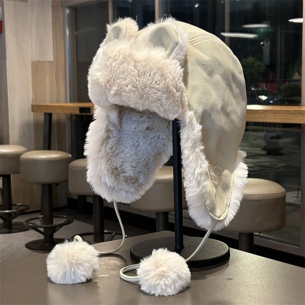 居心地の良いフェイクレザーのクマ耳トラッパーハット、耳当て付 - Winter Trapper Hat のレビューと価格
